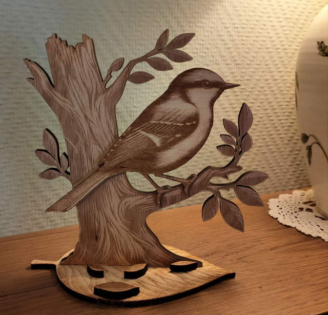 L&#039;oiseau sur sa branche (gravure)