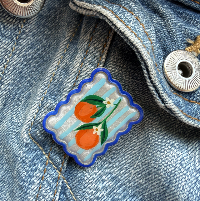 Orange Blossom Blue Stripe Postage Stamp Pin Badge