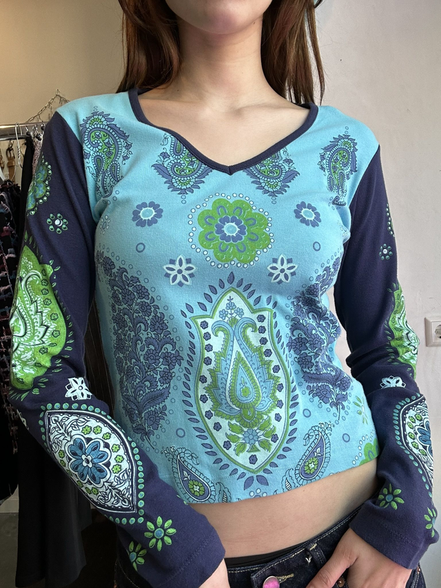 blue and green printed longsleeve top