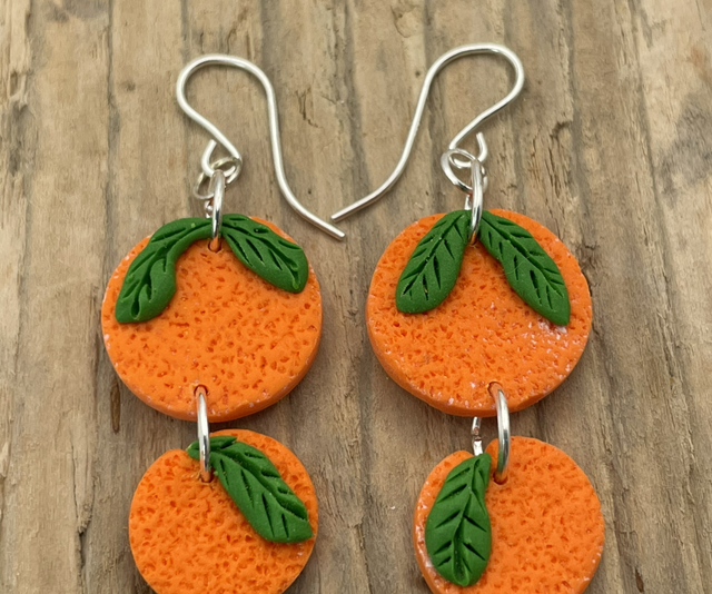Double orange dangly earrings