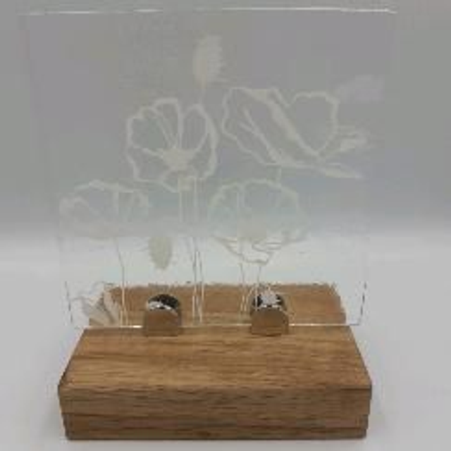 White poppies in stand