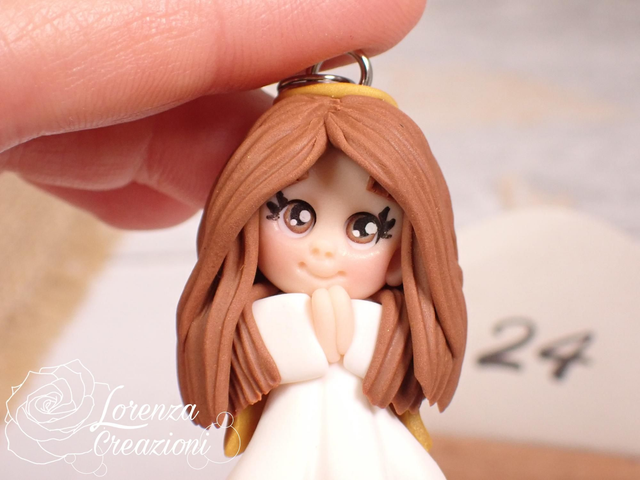 Angioletto custode tascabile n. 24
Portachiavi o charm, artigianale, pezzo unico. Modellato a mano argilla polimerica, made in Italy.