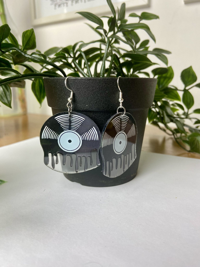 Drippy vinyl record earrings with white.