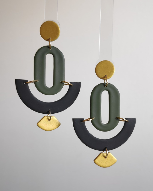 Art Déco negros, verde y dorado