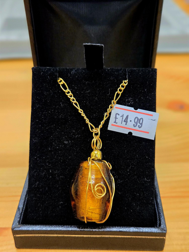 Gold wire wrapped Amber glass necklace