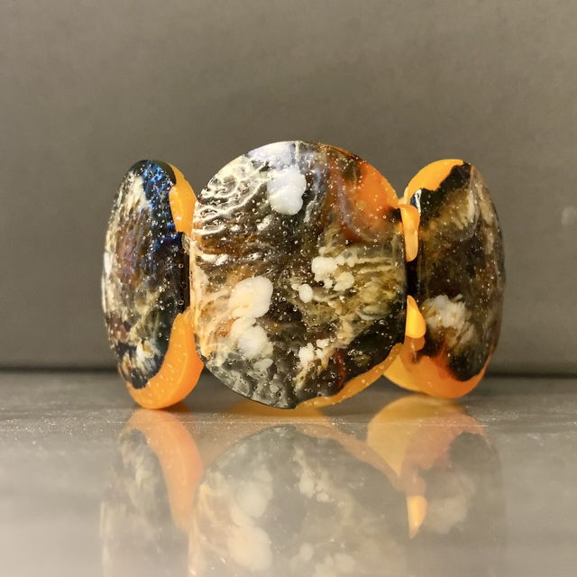 Bracelet Skiny - nuances noir orange et blanc 