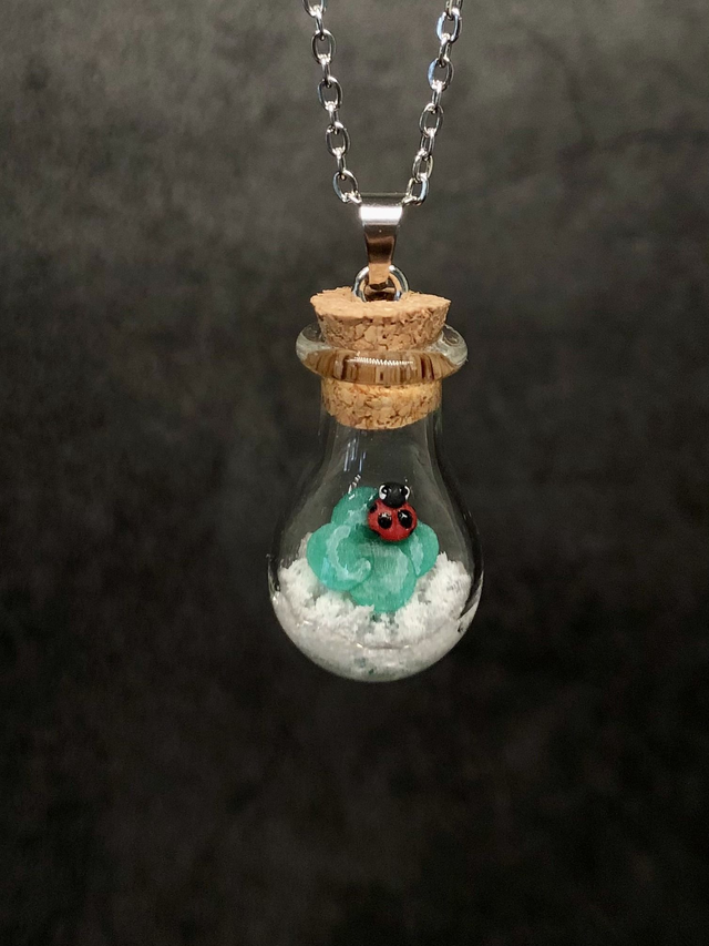 Pendentif trèfle à 4 feuilles neige