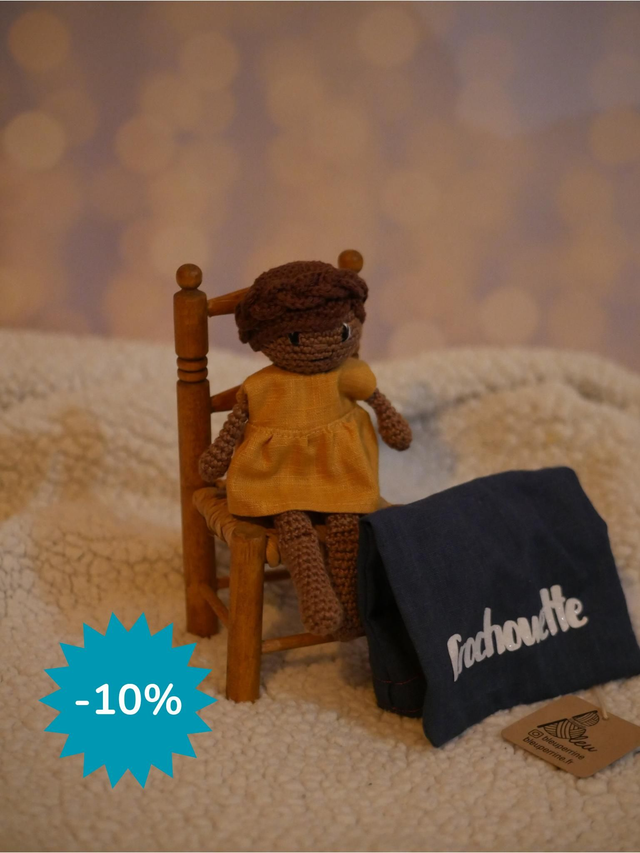 La crochouette peau noire, tresse brune 