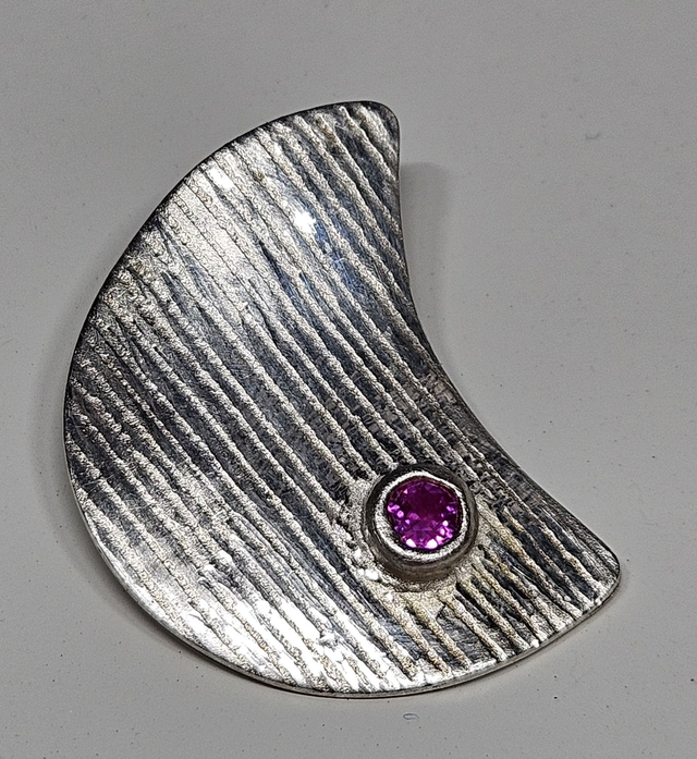 Crecent moon with fuschia cubic zirconia