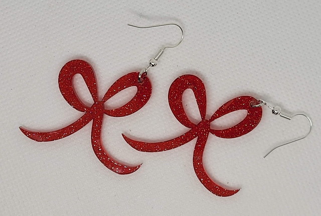 Kerststrik oorbellen - rood glitter