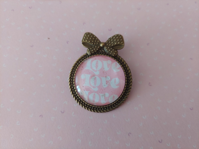 Broche Noeud Love rose