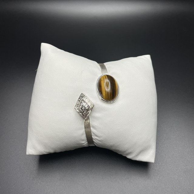 Eleganza e audacia intrecciate – Bracciale in argento 925 con dente di leone 