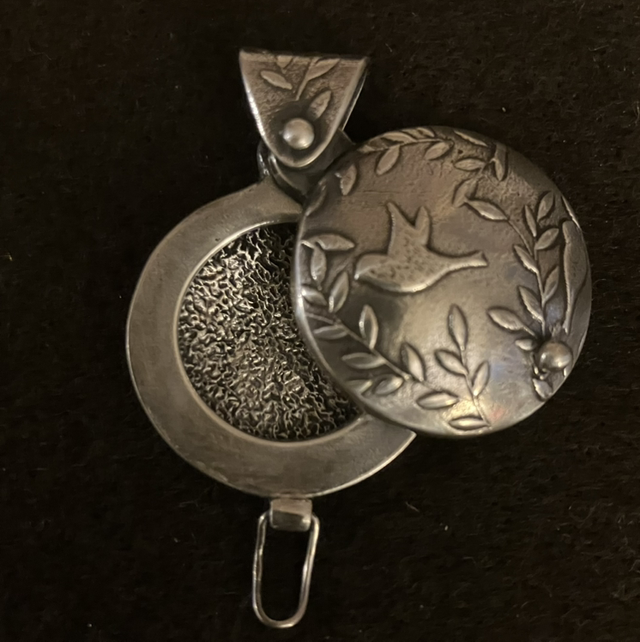 Birds fine silver swing locket