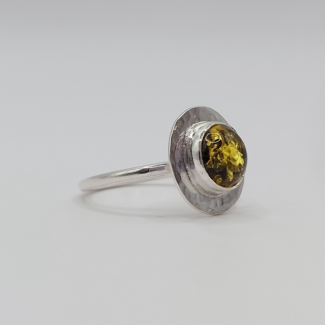 Sterling silver disc ring with green amber gemstone
