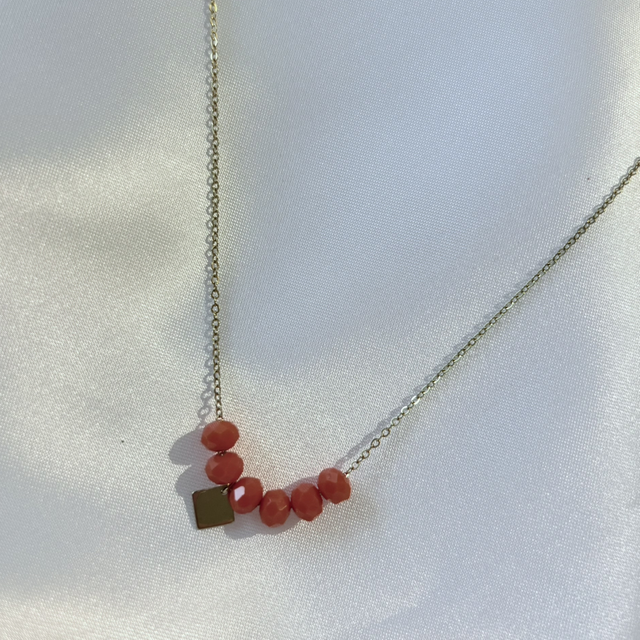 Collier boule orange 