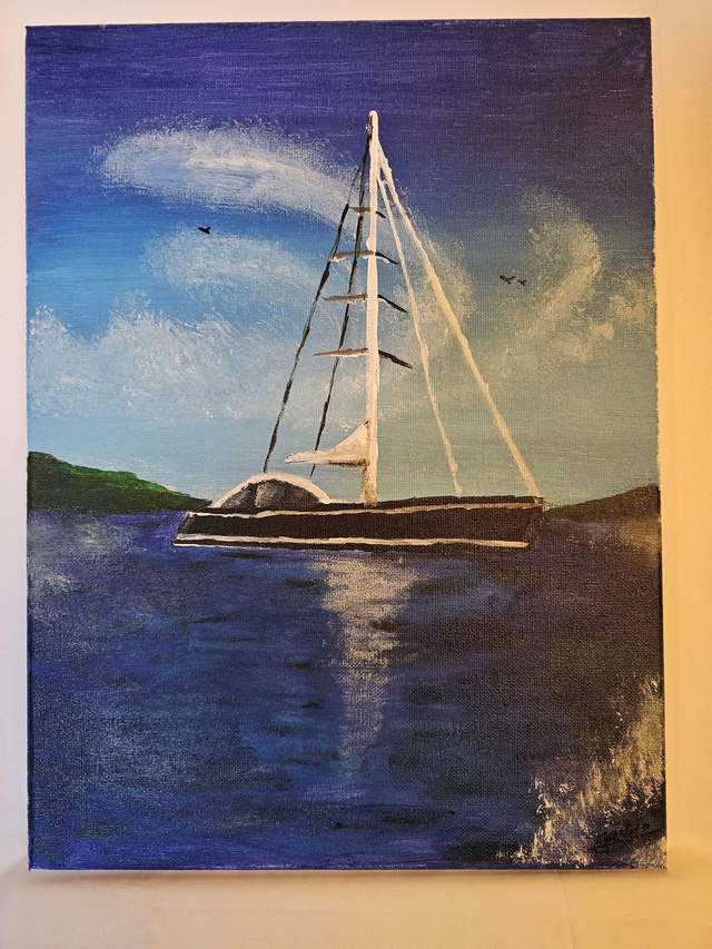 Sail Boat in Blue Water