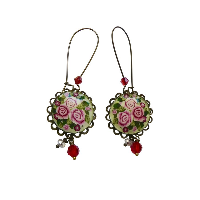 Boucles d&#039;oreilles pendantes trois roses
