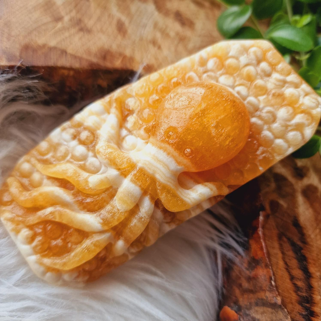 Orange Calcite Handcarved Octopi 288g