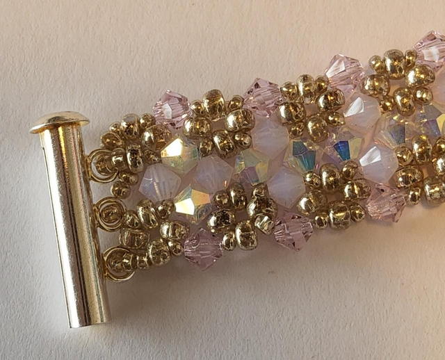 Handsewn cuff style bracelet 