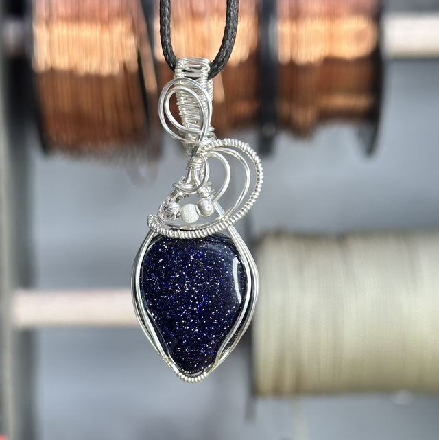Blue goldstone 925 silver wrapped pendant 