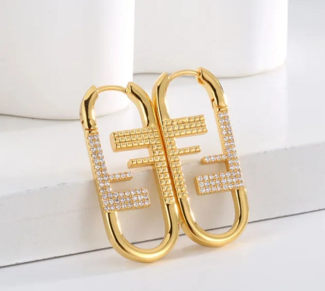Boucles d'oreilles FD doré avec strass