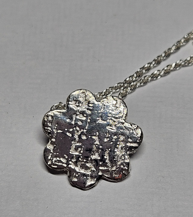 Flower textured fine silver pendant