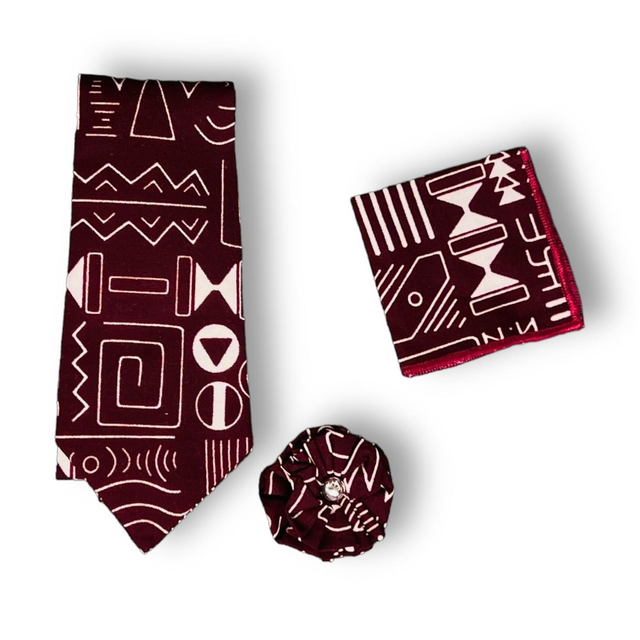 Cravate, mouchoir de poche et pins