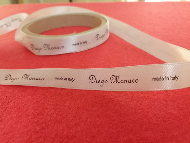 Nastro doppio raso bianco da mm. 15 stampa ad un colore nero