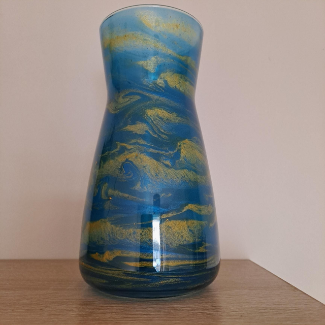 Dark blue and gold swirl