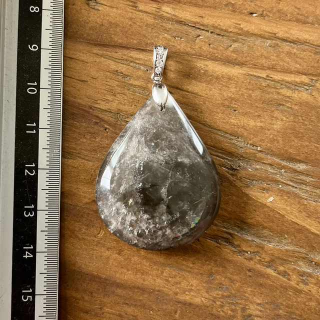 Pendentif en Pierre de Lune Noire et bélière argent en zircons