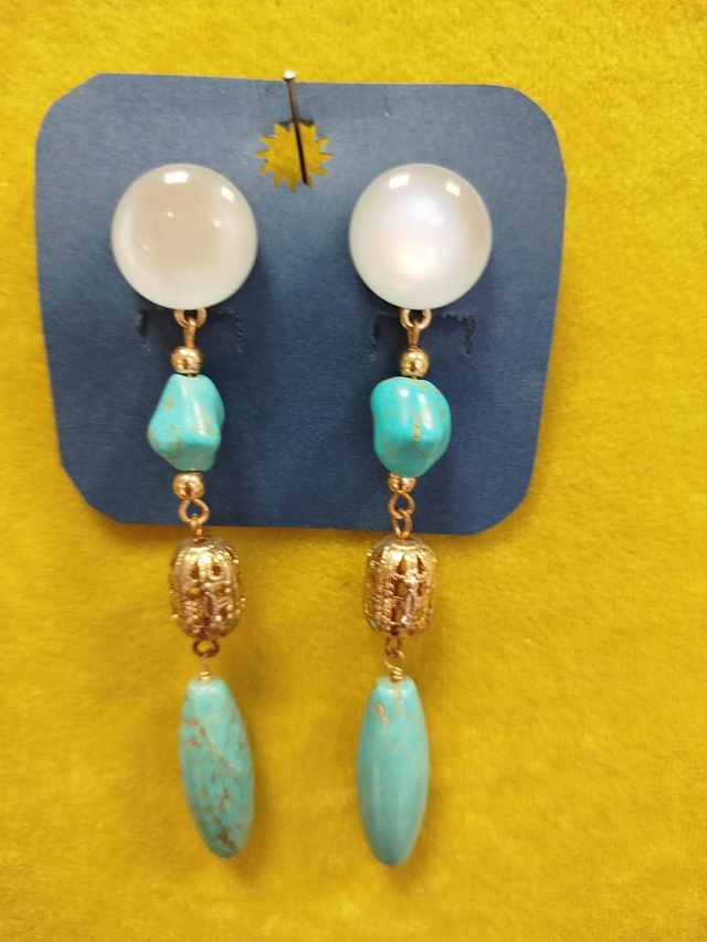 Brincos longos turquesa