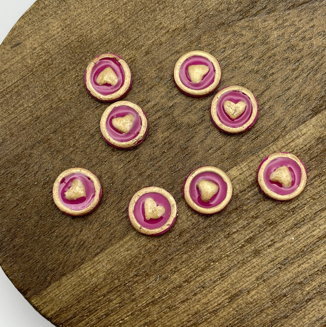 Pink and gold heart studs