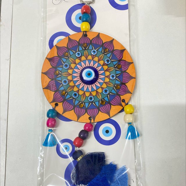 Colgante ojo turco con mandala y bolas