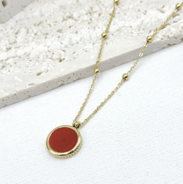 Collier perle rouge