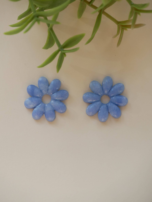 Marguerites bleues translucides