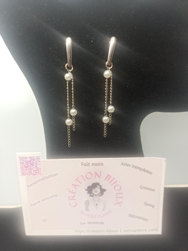 Boucle d'oreille pendante perle