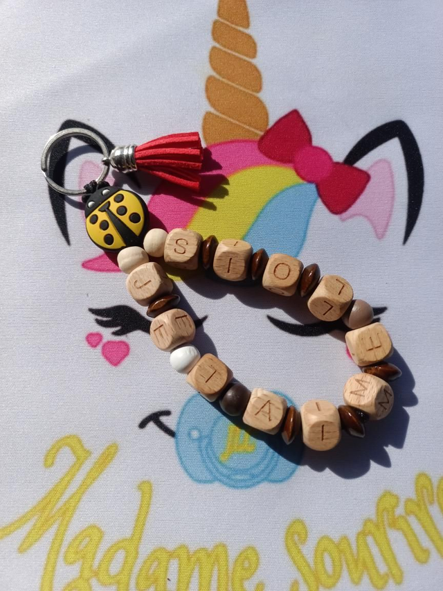 Porte clés boucle Coccinelle 