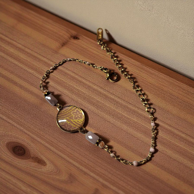bracelet acier inoxydable motifs japonais rose clair et doré