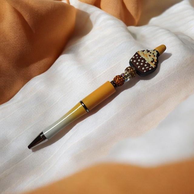 Stylo perles orange marron