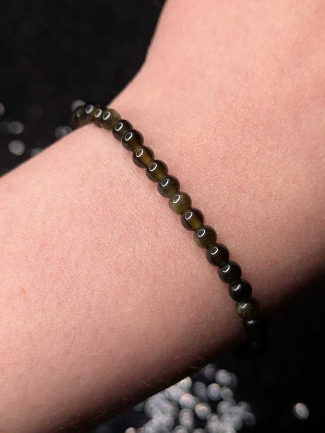 Bracelet obsidienne dorée 