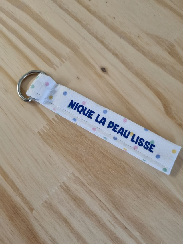 Porte-clé &quot;nique la peau lisse&quot;