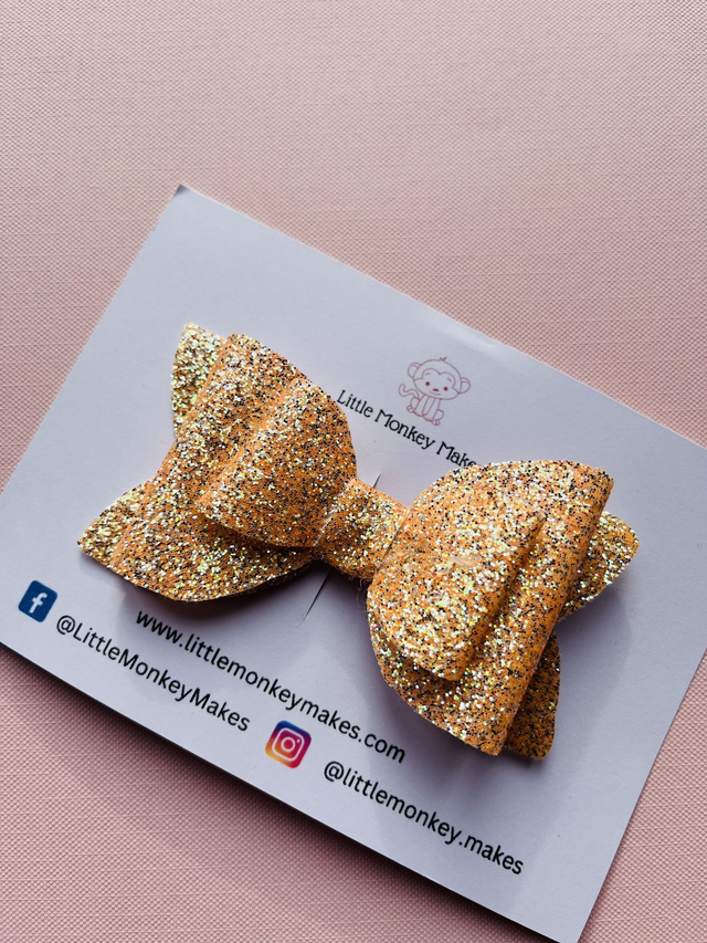 Orange bow with silver glitter