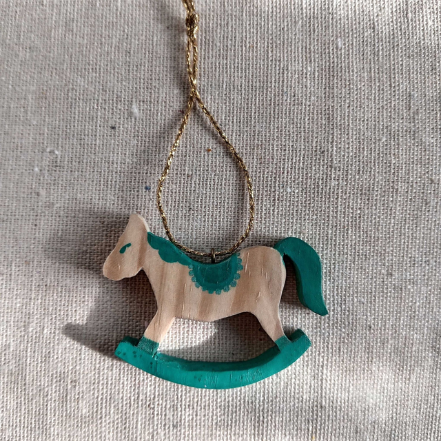 Cheval à bascule vert