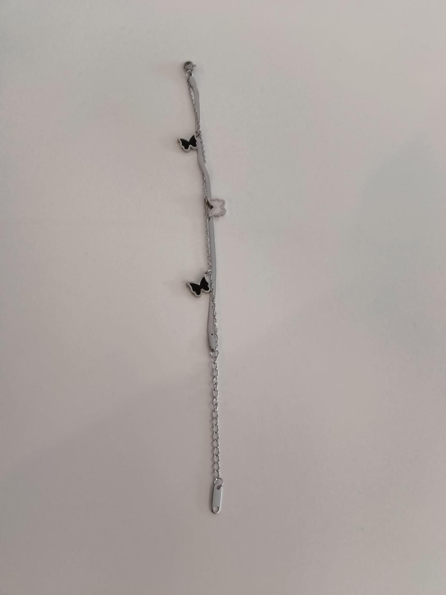 Zwart met witte  vlinders zilverkleurig