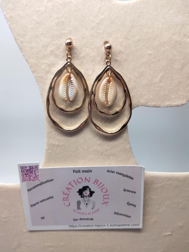 Boucle d'oreille ovale et coquillage 
