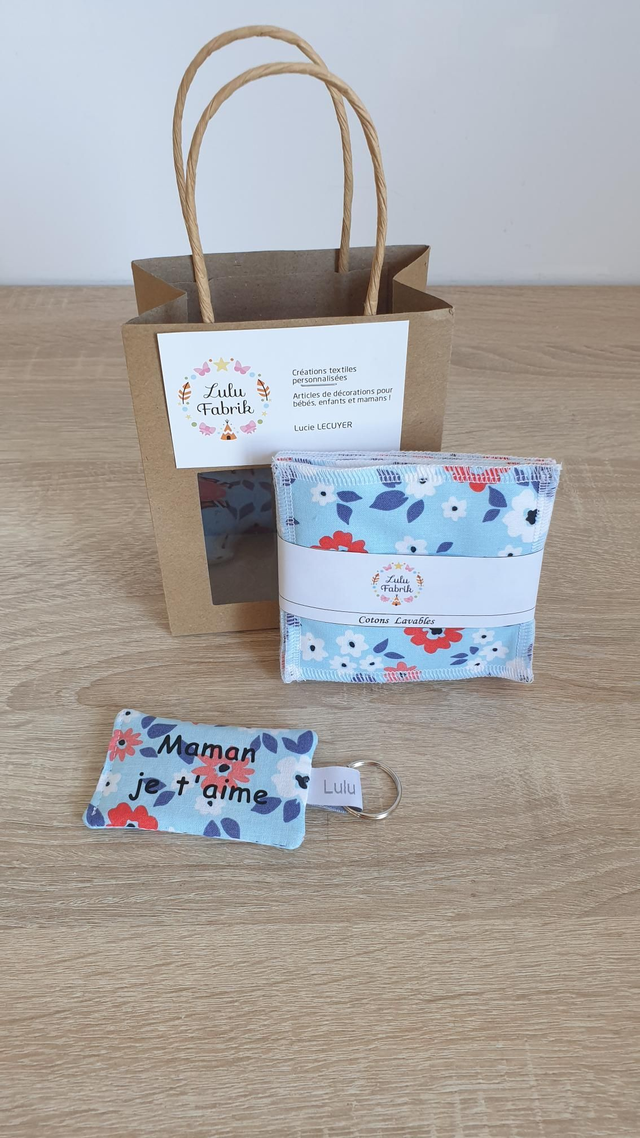 Petit sac avec 7 cotons démaquillants + porte clés fleurs bleu