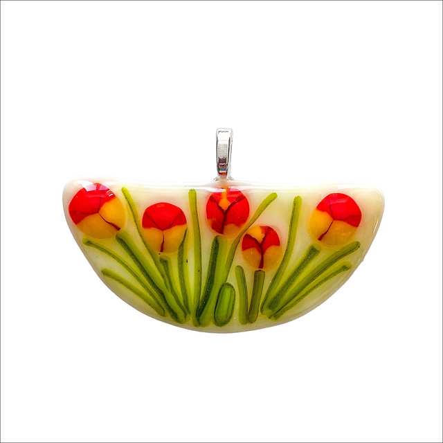 Pendant in an unusual cream half circle shape with green stems and red flowers (Ref P35) 