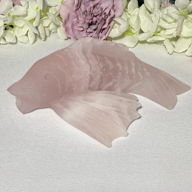 Hand carved rose quartz koi carp 