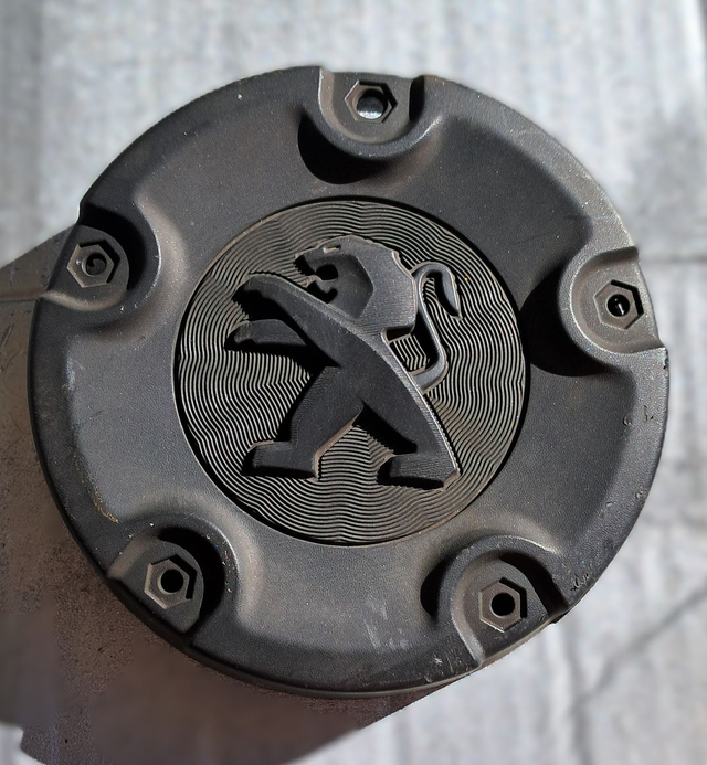 Enjoliveur Peugeot Cache moyeu Partner K9 Occasion