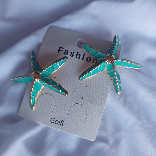 Pendiente estrella azul